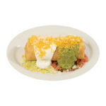 chimichanga topped with sour cream, guacamole, and cheese